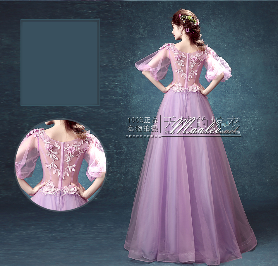 พร้อมเช่า ชุดแฟนซียาว แบบแขนยาว จั๊มปลายแขนน่ารักมาก เนื้อผ้าเป็นตาข่ายแบบซีทรู แต่งดอกและลูกปัด สีม่วง (ซิปหลัง)