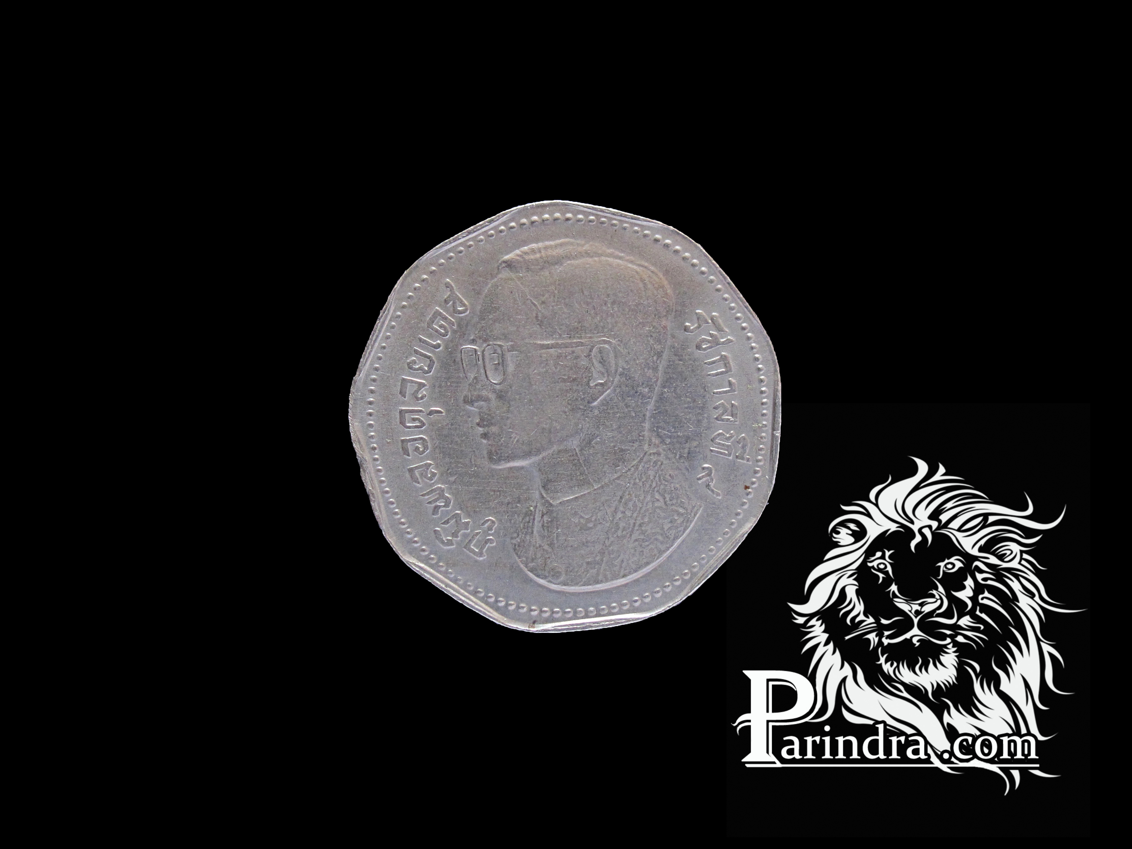 เหรียญกษาปณ์ 9 เหลี่ยมตราครุฑพ่าห์ พ.ศ.2515 ราคา 5 บาท (3)