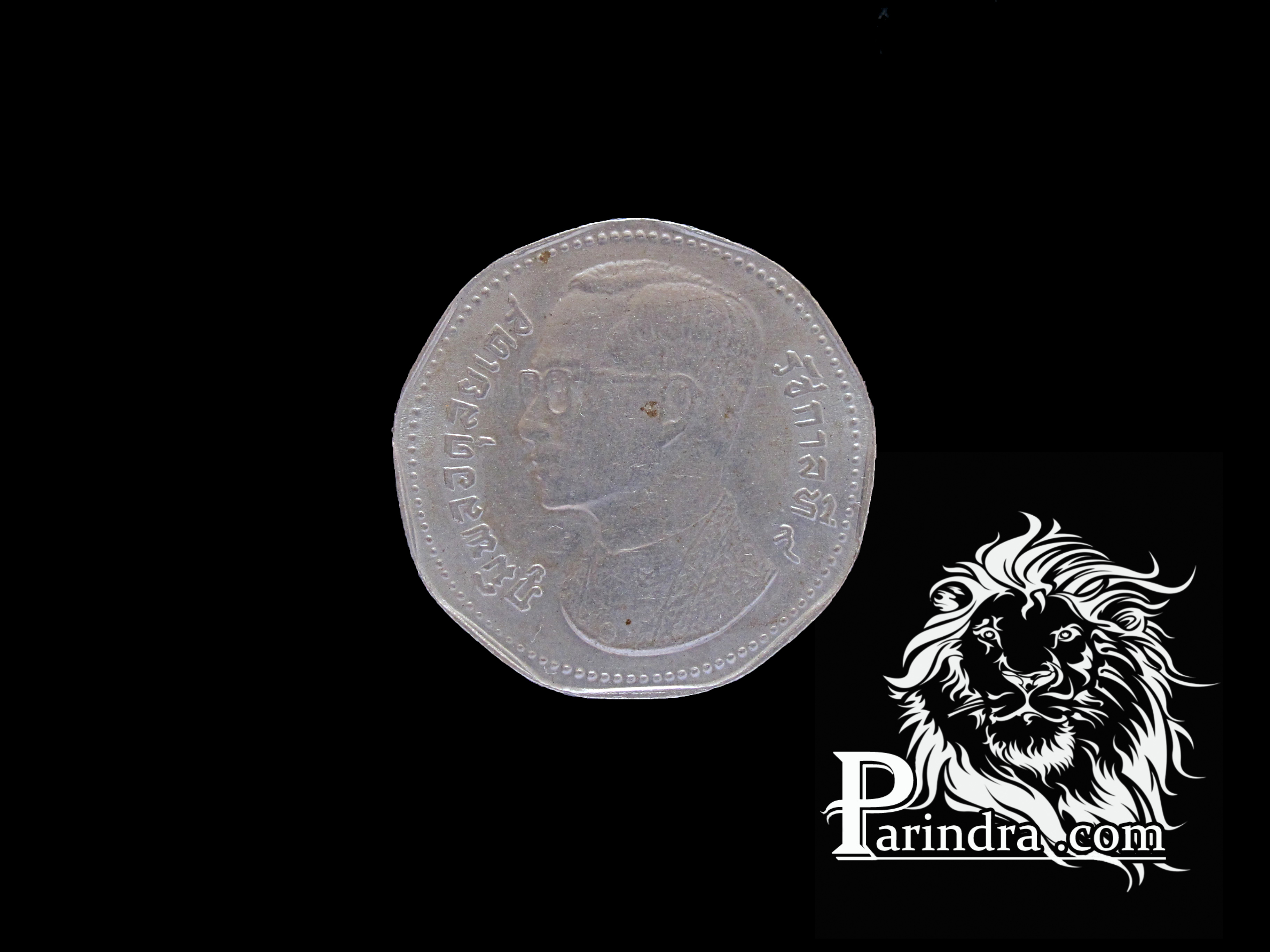 เหรียญกษาปณ์ 9 เหลี่ยมตราครุฑพ่าห์ พ.ศ.2515 ราคา 5 บาท (1)