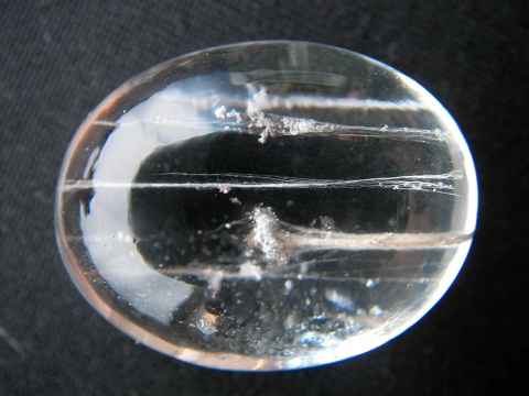 QU0019 QUARTZแก้วขนเหล็กสลักเสี้ยนลอยทั่วเม็ดเสริมเม็ดพระธาตุลอย กลางเม็ดแก้วด้วยเสน่ห์แห่งพระธาตุขนาดเม็ดแก้ว 20.22x26.19x14.00 mm.นน.52.53ct.ขายแล้ว