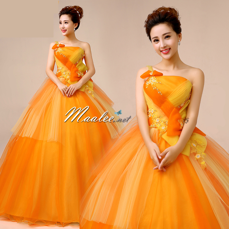 พร้อมเช่า ชุดแฟนซี ชุดราตรี ไหล่เดียว สีส้มแต่งระบายสีเหลือง น่ารัก แต่งโบว์เพิ่มความหวาน