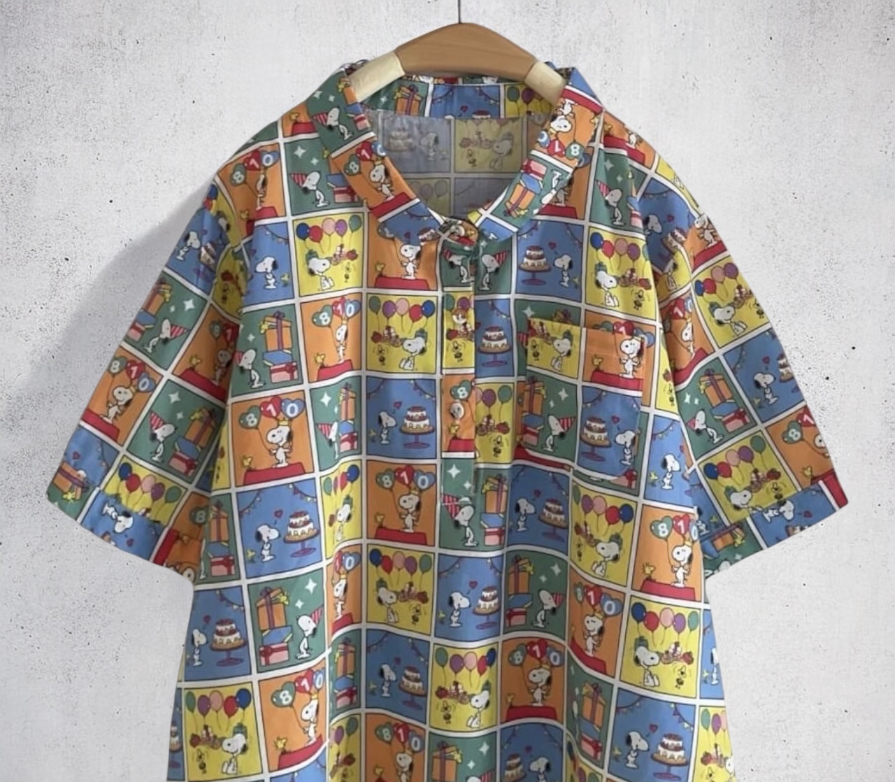 เสื้อผ้าฝ้ายลายพิมพ์แต่งกระเป๋า