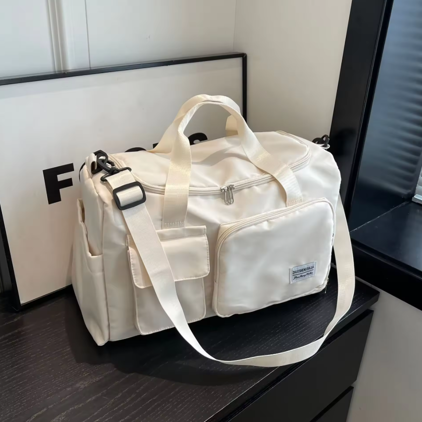 กระเป๋าเดินทางแบบหิ้วพร้อมสายสะพายข้าง รุ่น 011ZMN ขนาด ก.48*ส.28*ก้น 21 ซม.