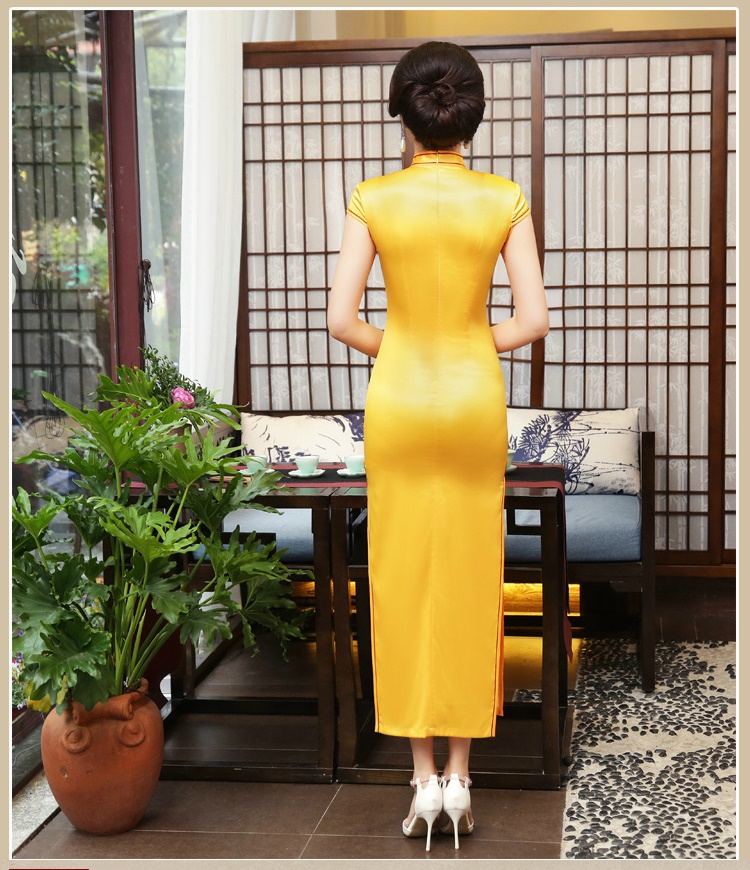 Pre-order กี่เพ้า สีเหลือง ลายดอกไม้ ผ่าข้าง กุ๊นขอบอย่างดี