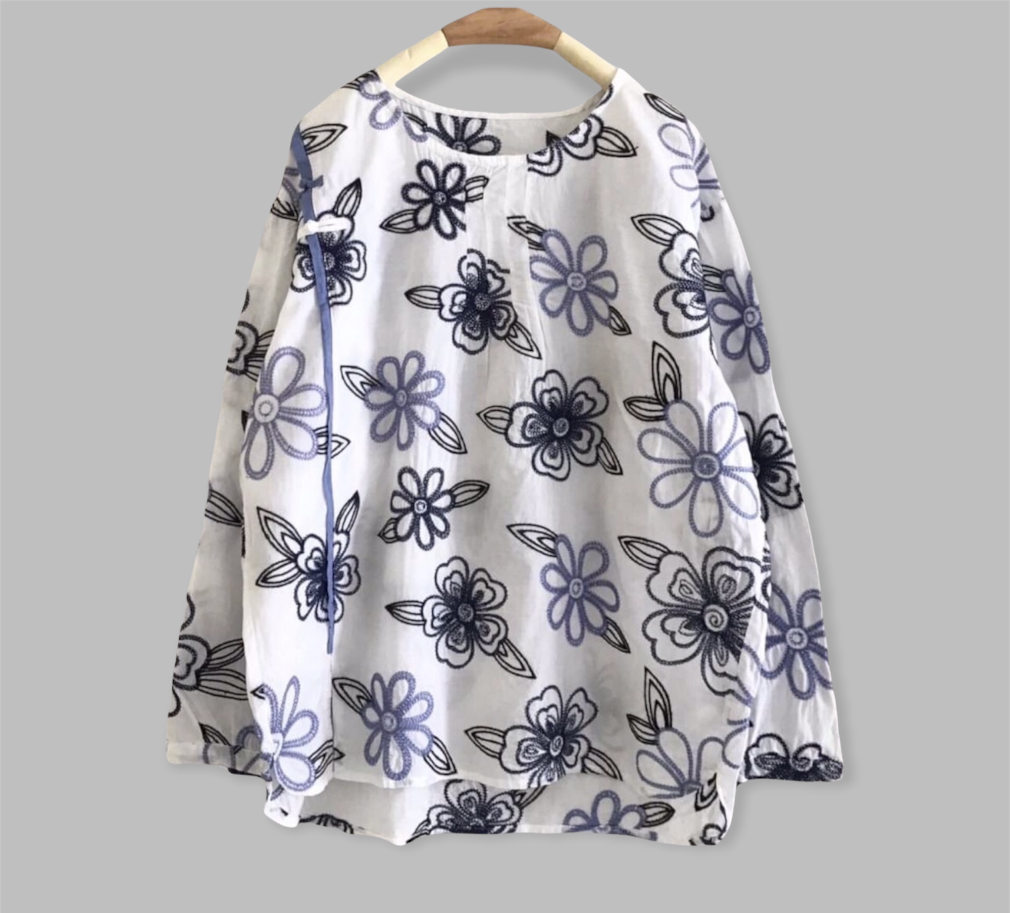 เสื้อผ้าฝ้ายลายปักดอกไม้
