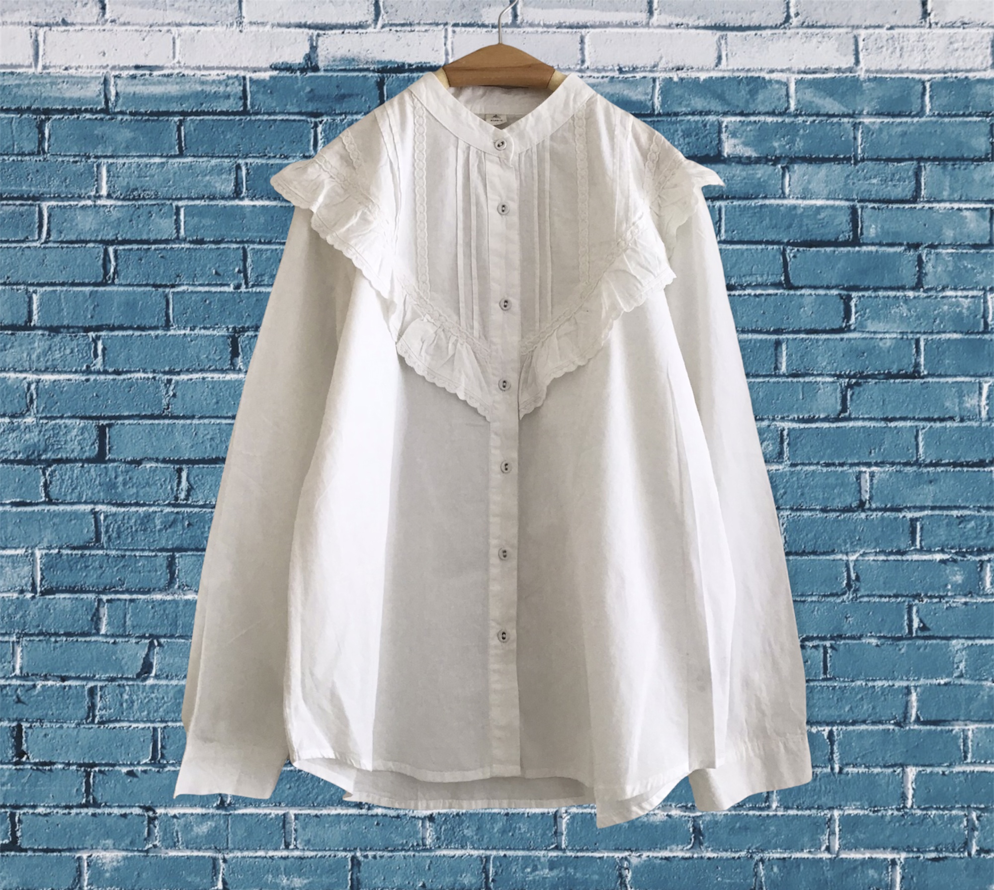 เสื้อเชิ้ตผ้าคอตตอนแต่งระบาย