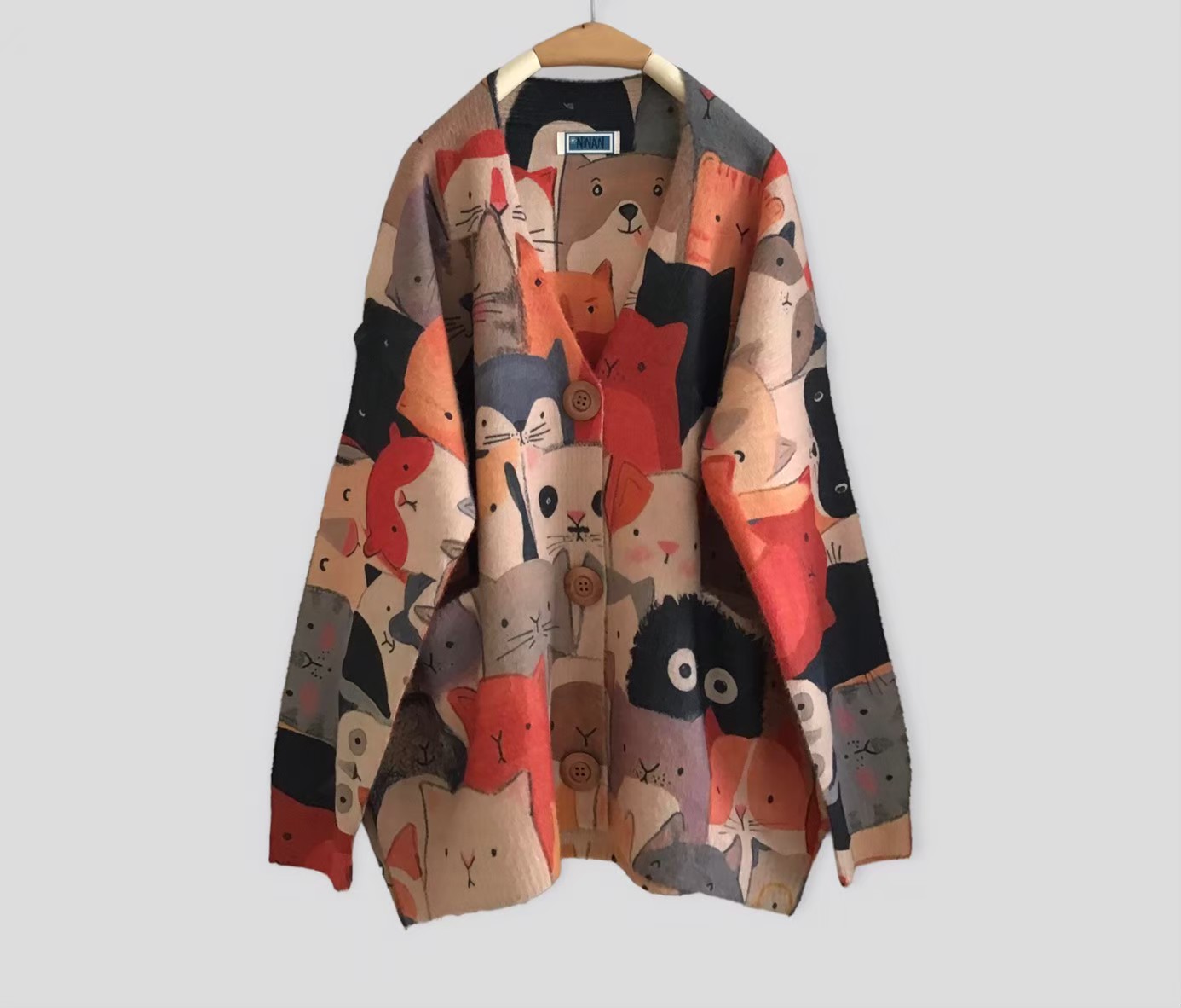เสื้อคลุมไหมพรมนุ่มแต่งกระเป๋า