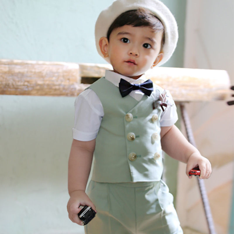 พร้อมเช่า ชุดสูทเด็กชาย สีเขียว กระดุมสองแถว ทอลายในเนื้อผ้า **พร้อมเช่าไซส์ 120, 150**