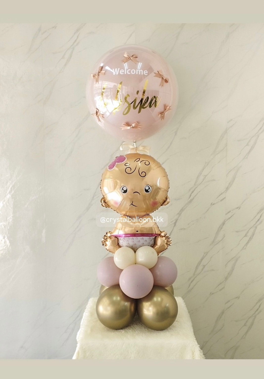 ลูกโป่ง Welcome Baby Girl ฟอยล์เด็กผญ. ตั้งฐาน 1 ชิ้น สีคาเมเลียโครเมียม/Sand/Dusk Pink ลูกโป่งยาง สี Dusk Pink 1 ลูก พร้อม ประดับโบว์จิ๋ว 6 ชิ้น พร้อมตกแต่ง สามารถเปลี่ยนสีลูกโป่ง/เปลี่ยนฟอยล์ตกแต่งได้