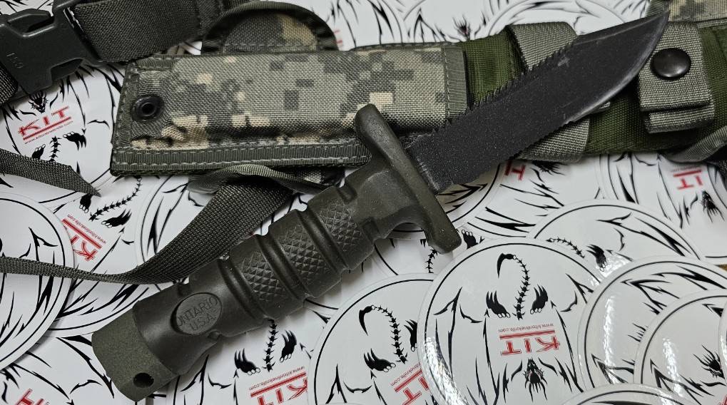 Ontario ASEK Survival Knife System FG/UC 5" Combo Blade, OD Green Rubber Handle, Strap Cutter, Digital Camo Sheath