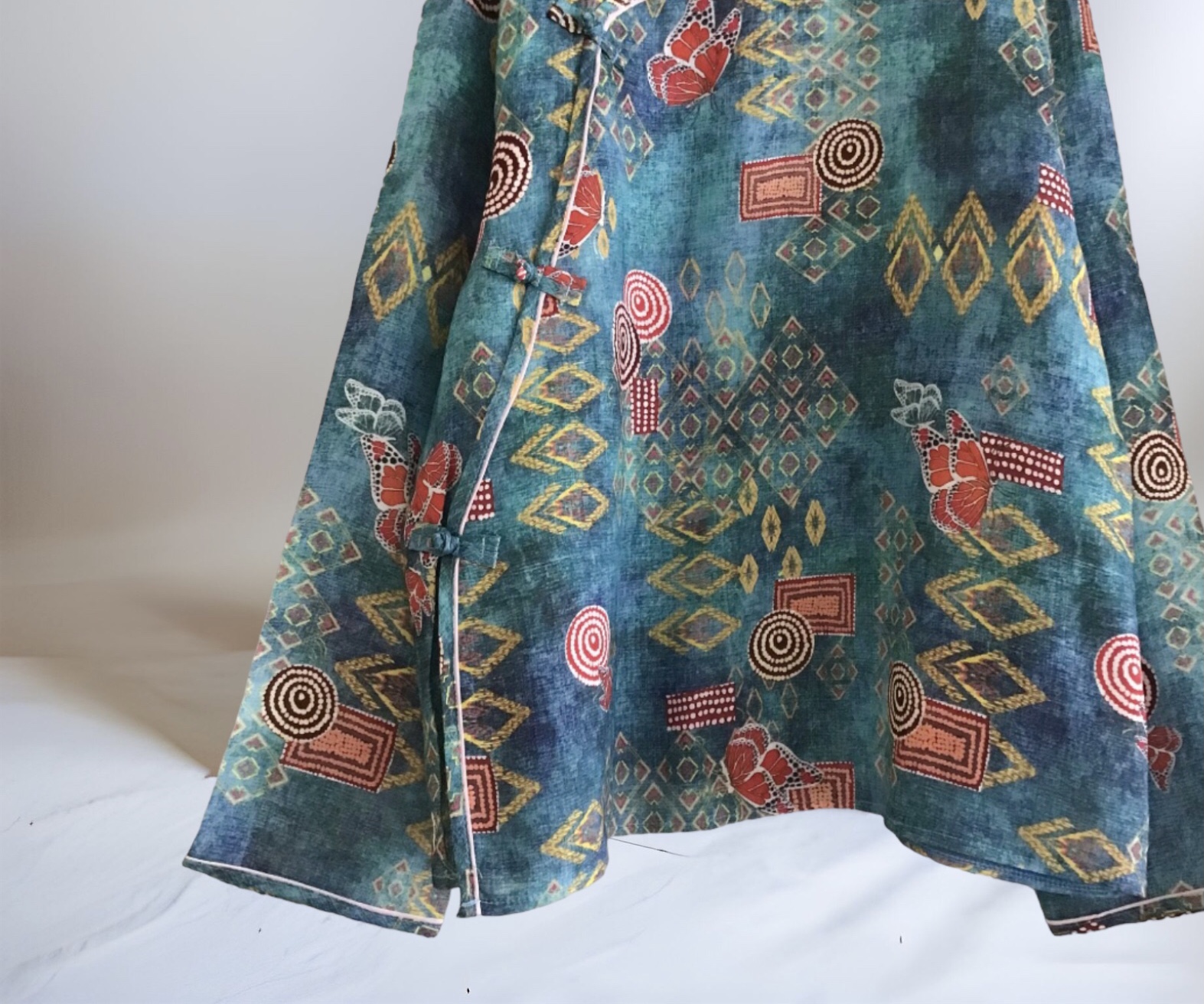 เสื้อคอจีนผ้าลินินแต่งกระดุมปม