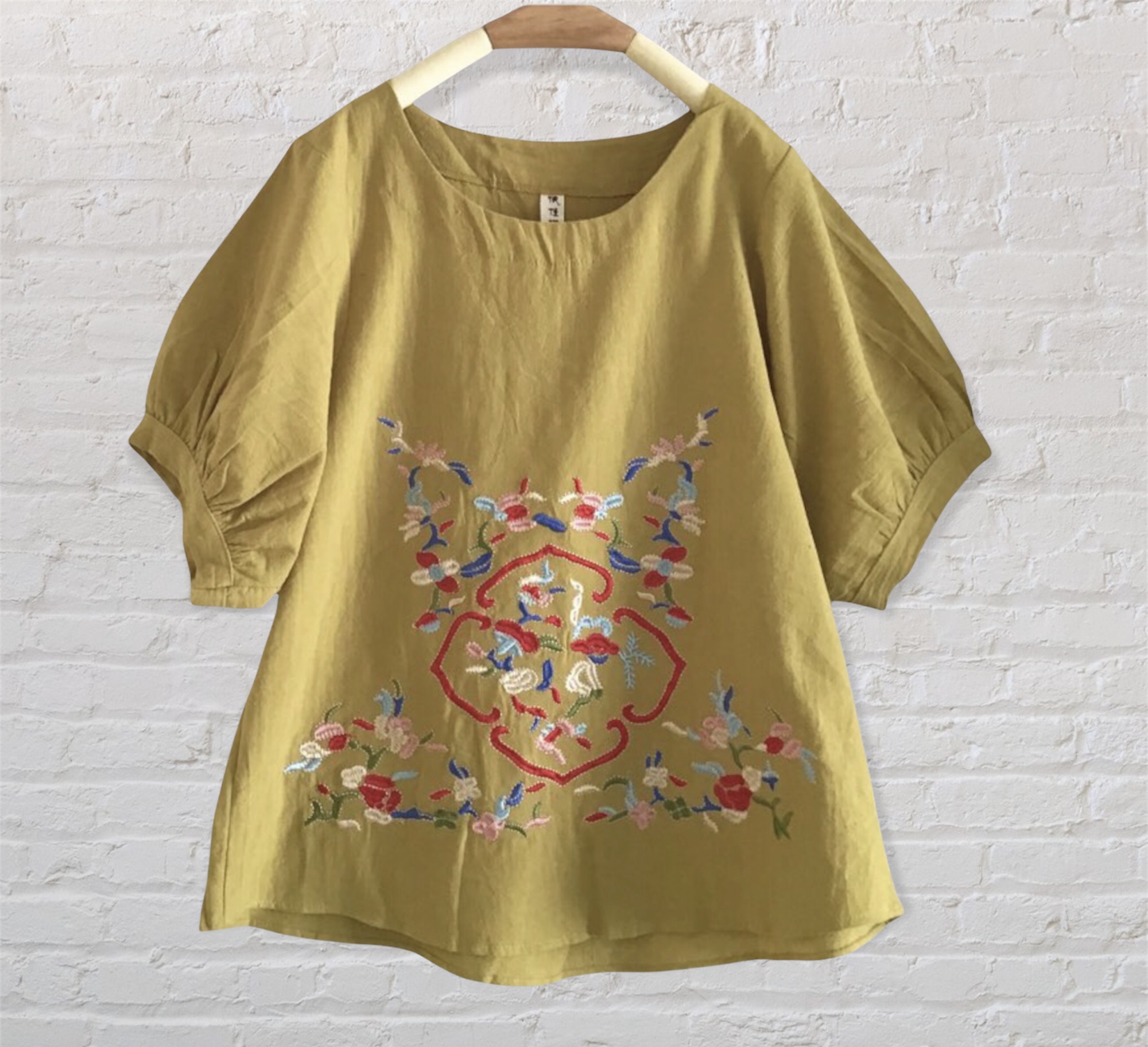 เสื้อผ้าฝ้ายปักลายดอกไม้