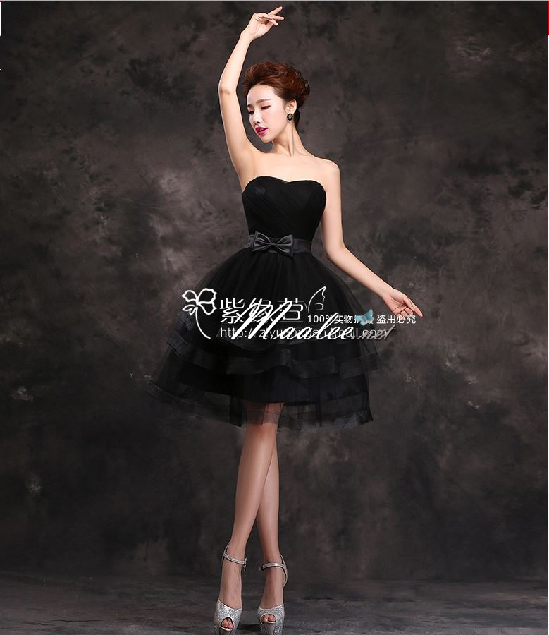 พร้อมเช่า ชุดราตรีสั้น เกาะอก กระโปรงระบาย 3 ชั้น แต่งโบว์ช่วงเอว สีดำ (ด้านหลังเป็นเชือกผูก)