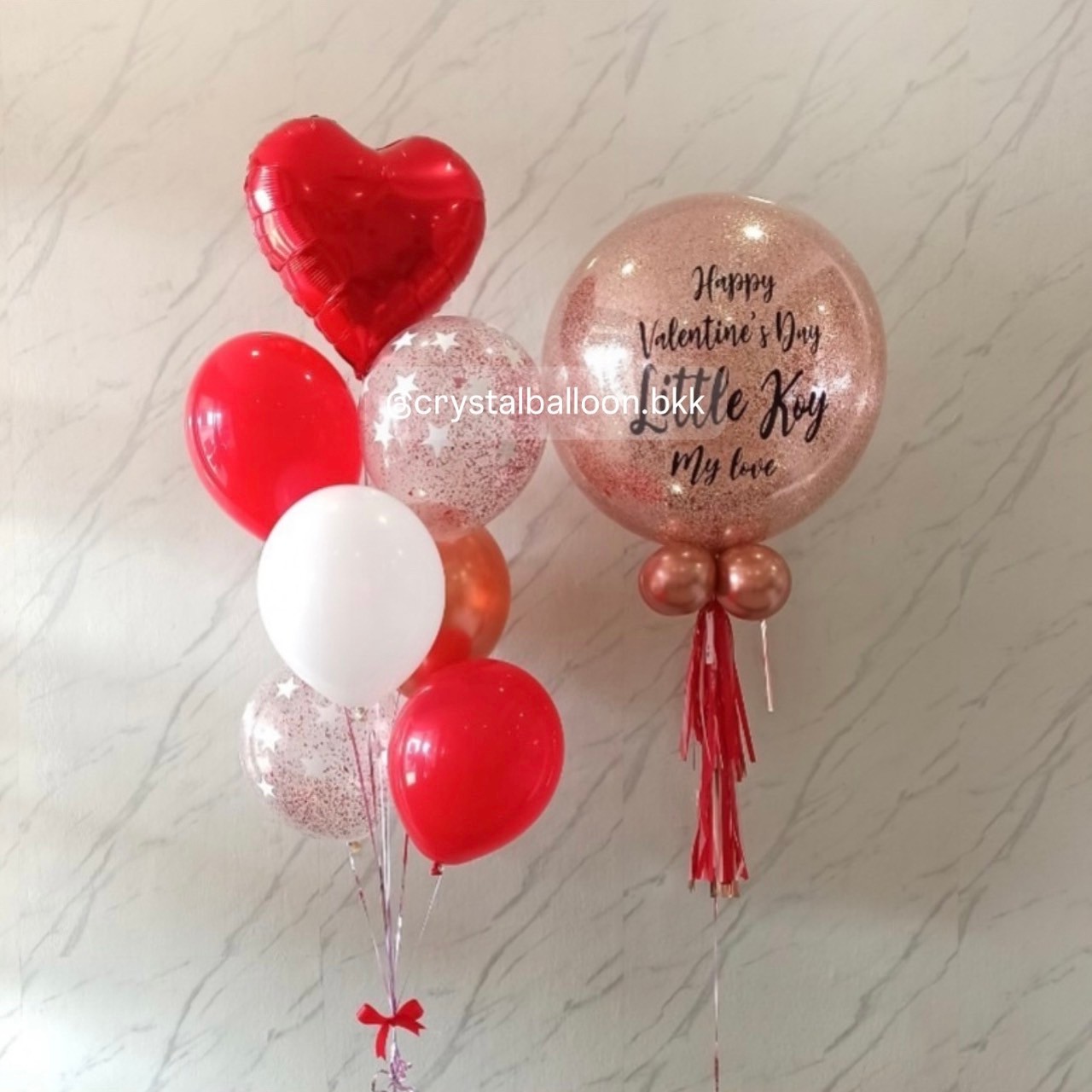 ลูกโป่ง Valentine Bubble ขนาด 24" กลิตเตอร์สีโรสโกล 1 ลูก พร้อม ช่อลูกโป่งฟอยล์หัวใจ ขนาด 18" ช่อ 7 ลูก 1 ช่อ พร้อมตกแต่ง สามารถเปลี่ยนสีลูกโป่ง/เปลี่ยนข้อความ/เปลี่ยนขนาด/เปลี่ยนชนิดอกไม้ได้