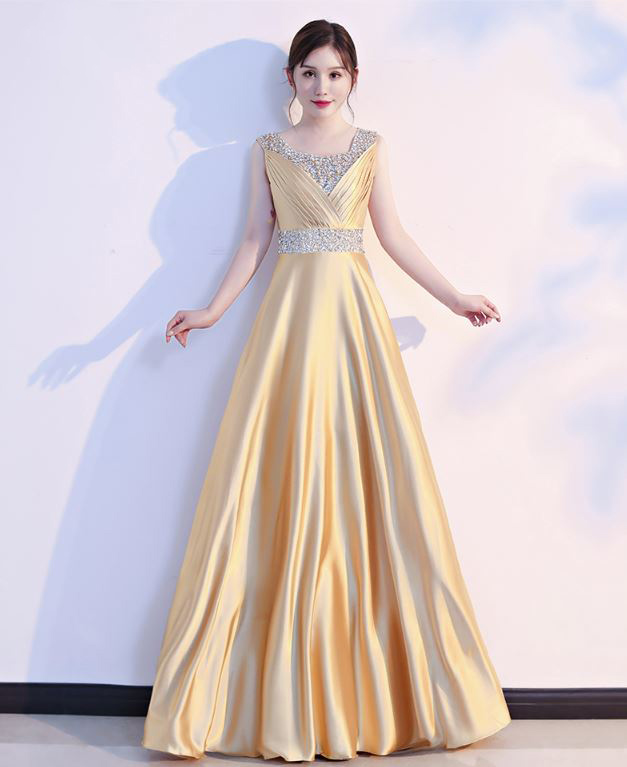 พร้อมเช่า ชุดราตรียาว สีทอง คอวี จับเดรปหน้าอก ปักเลือมช่วงอกและเอว