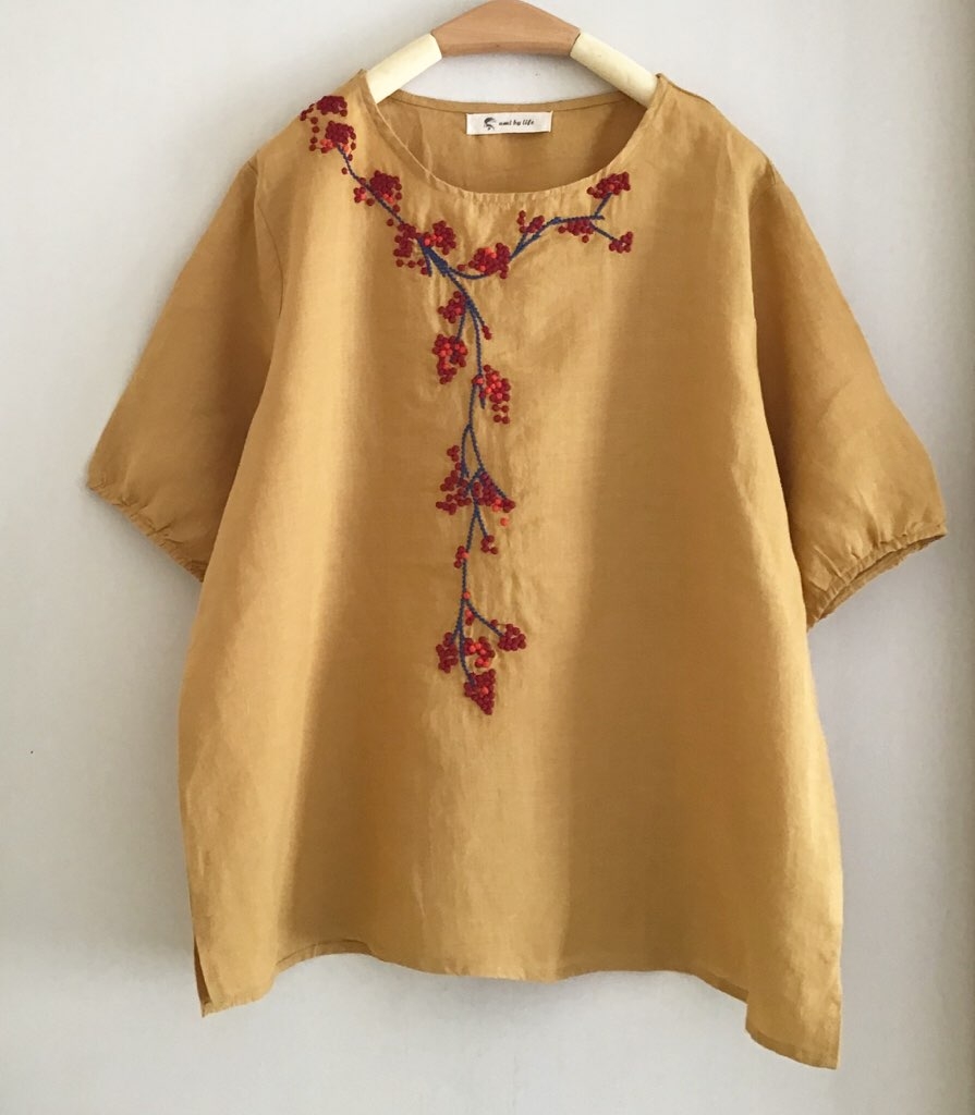 เสื้อผ้าลินินปักลาย