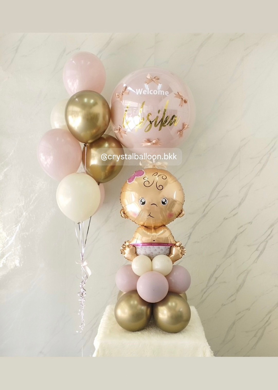 ลูกโป่ง Welcome Baby ฟอยล์เด็กผญ. ตั้งฐาน 1 ชิ้น ลูกโป่งยาง สี Dusk Pink 1 ลูก พร้อม ประดับโบว์จิ๋ว 6 ชิ้น ช่อ 7 ลูก 1 ช่อ สีคาเมเลียโครเมียม/Sand/Dusk Pink พร้อมตกแต่ง สามารถเปลี่ยนสีลูกโป่ง/เปลี่ยนฟอยล์ตกแต่งได้