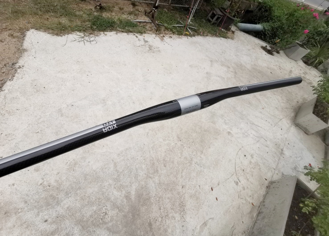 แฮนด์ตรงคาร์บอน XIDA LTD Flat CARBON HANDLEBAR ยาว 720มม. สีดำ/เทา
