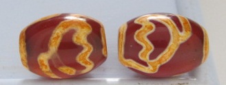 ลูกปัดธิเบตโบราณหิน.ดี.ซี.ไอ.ดอกบัวสีแดงจำนวน.2.เม็ด.