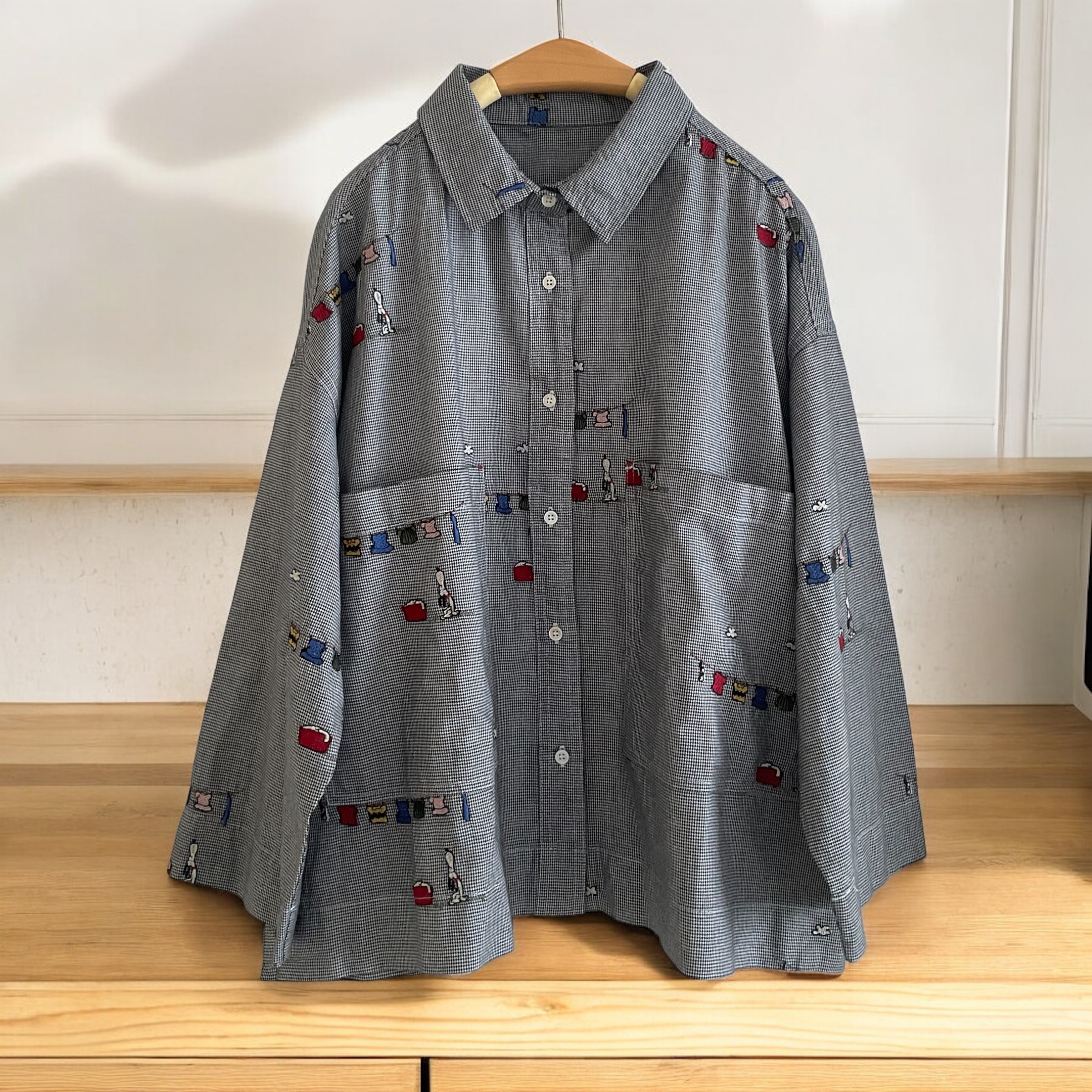 เสื้อผ้าฝ้ายลายปักแต่งกระเป๋า