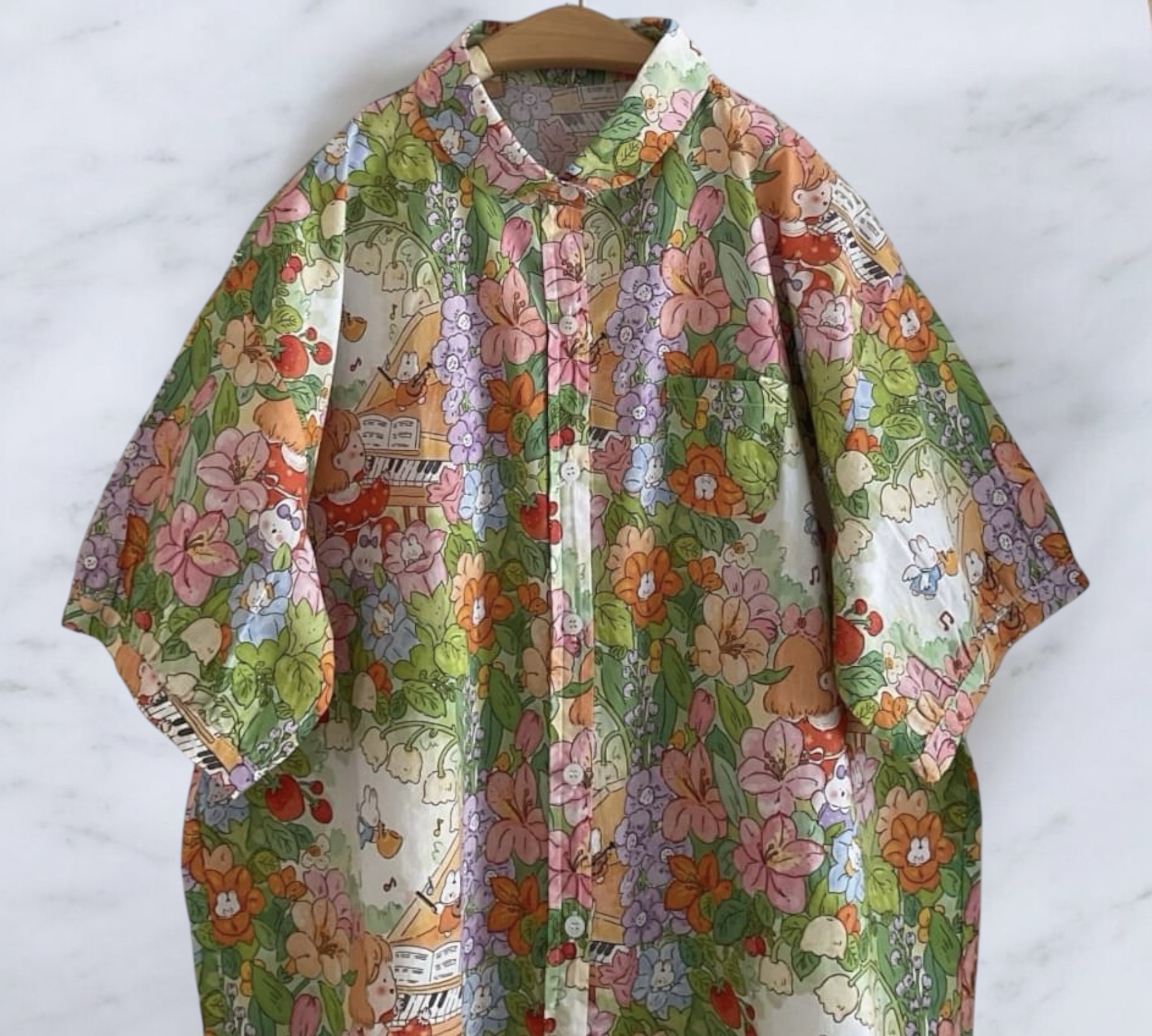 เสื้อผ้าฝ้ายลายดอกไม้แต่งกระเป๋า