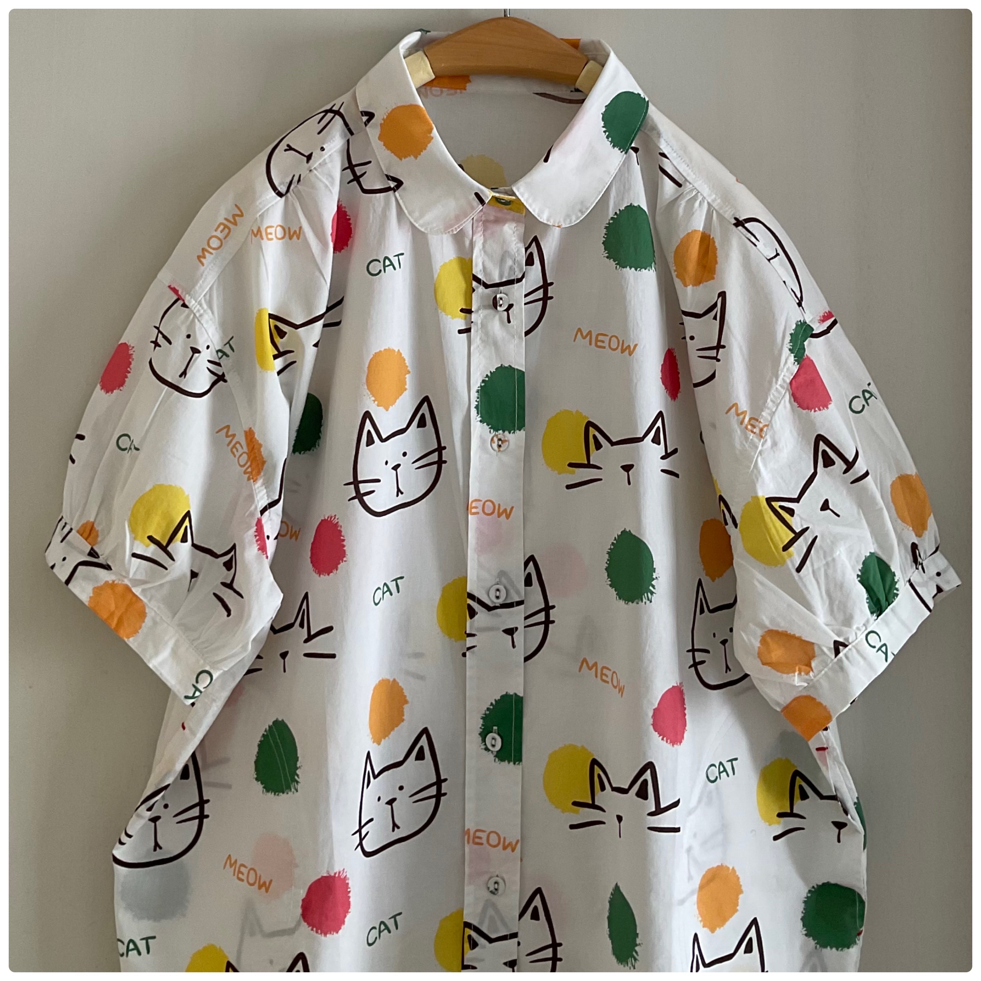 เสื้อผ้าฝ้ายพิมพ์ลายแมวแต่งกระเป๋าฃ้าง