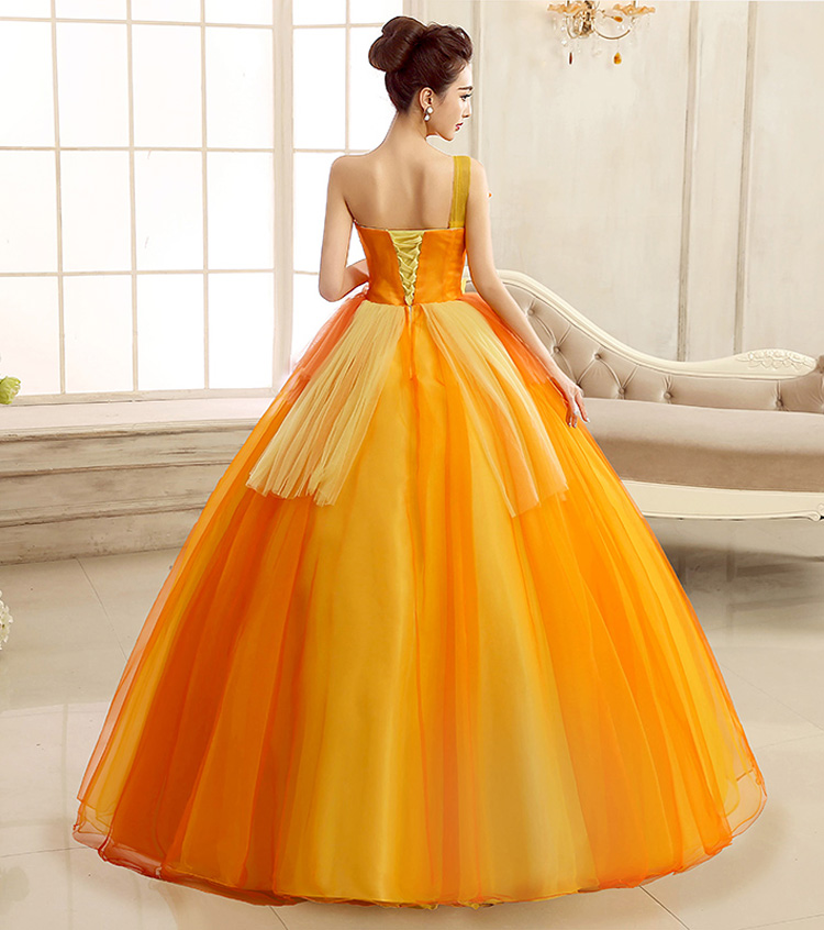 พร้อมเช่า ชุดแฟนซี ชุดราตรี ไหล่เดียว สีส้มแต่งระบายสีเหลือง น่ารัก แต่งโบว์เพิ่มความหวาน