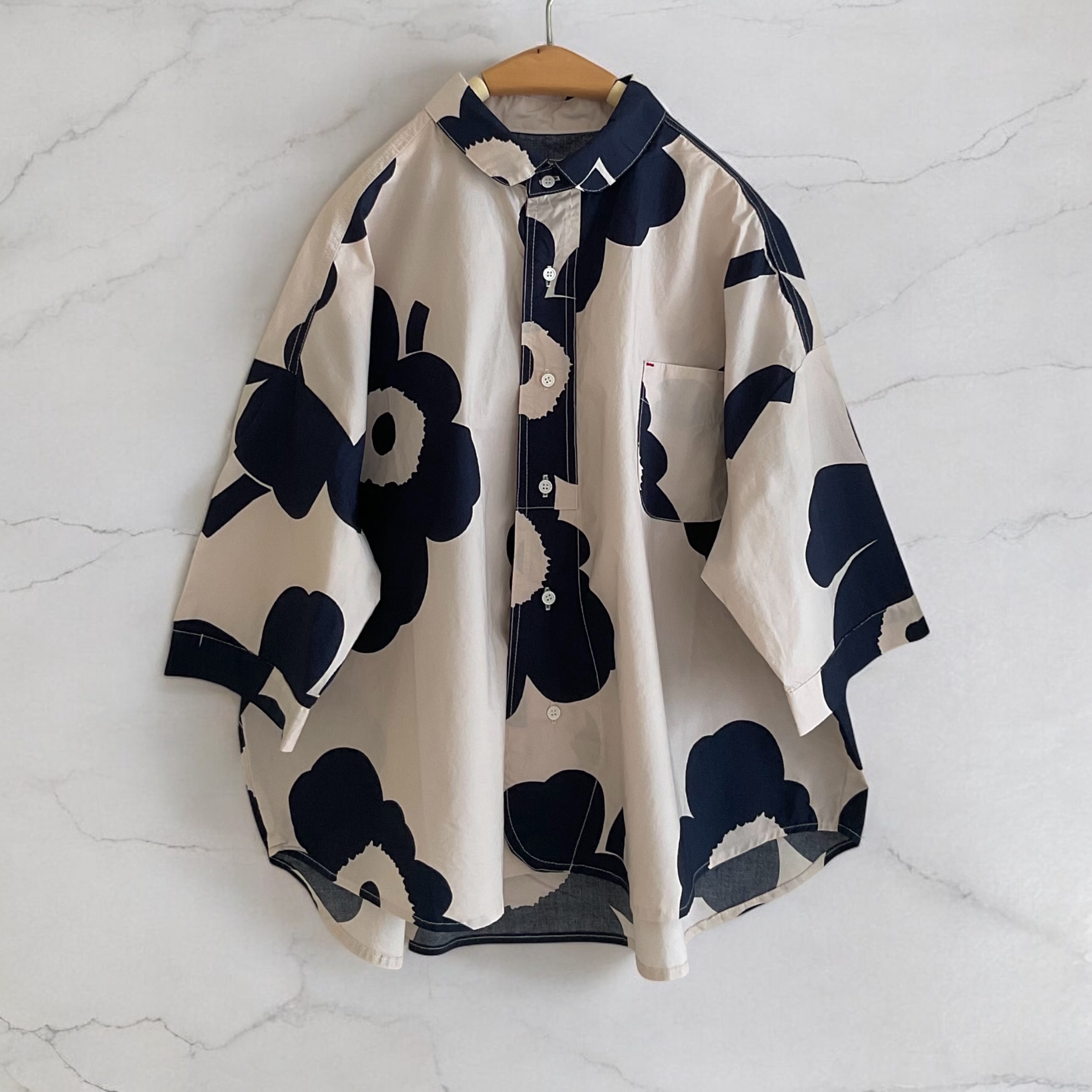 เสื้อผ้าฝ้ายลายดอกไม้แต่งกระเป๋า