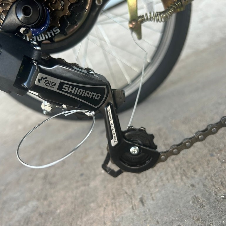 จักรยานสามล้อยี่ห้อ GEMODA ตะกร้าหน้าสแตนเลส ล้อ 20 นิ้ว มีที่นั่งด้านหลัง เกียร์ SHIMANO 6 SPEEDS รับน้ำหนักได้สูงสุด 200 กิโลกรัม