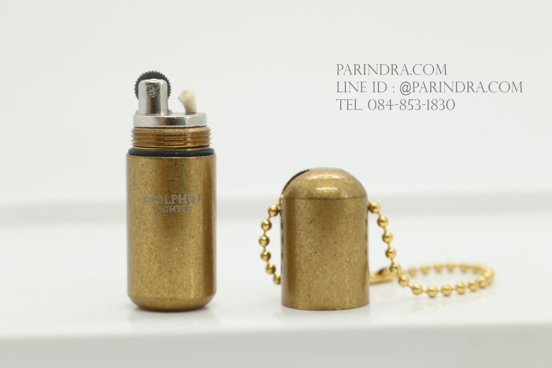 ไฟแช็คน้ำมัน Dolphin แบบแคปซูลกันน้ำ สีทอง สายห้อยสีทอง