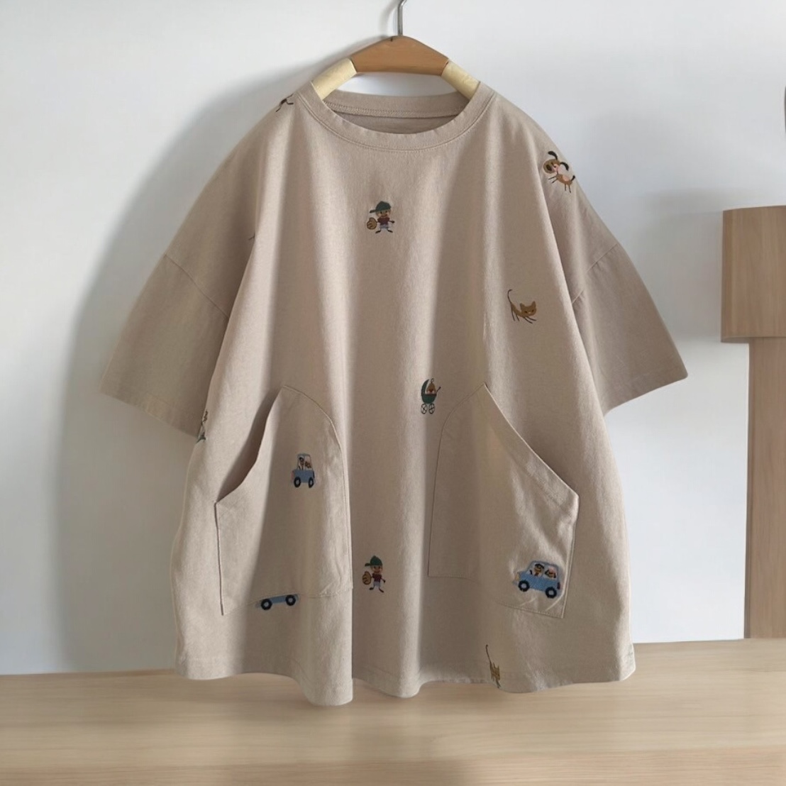 เสื้อยืดลายปักแต่งกระเป๋า