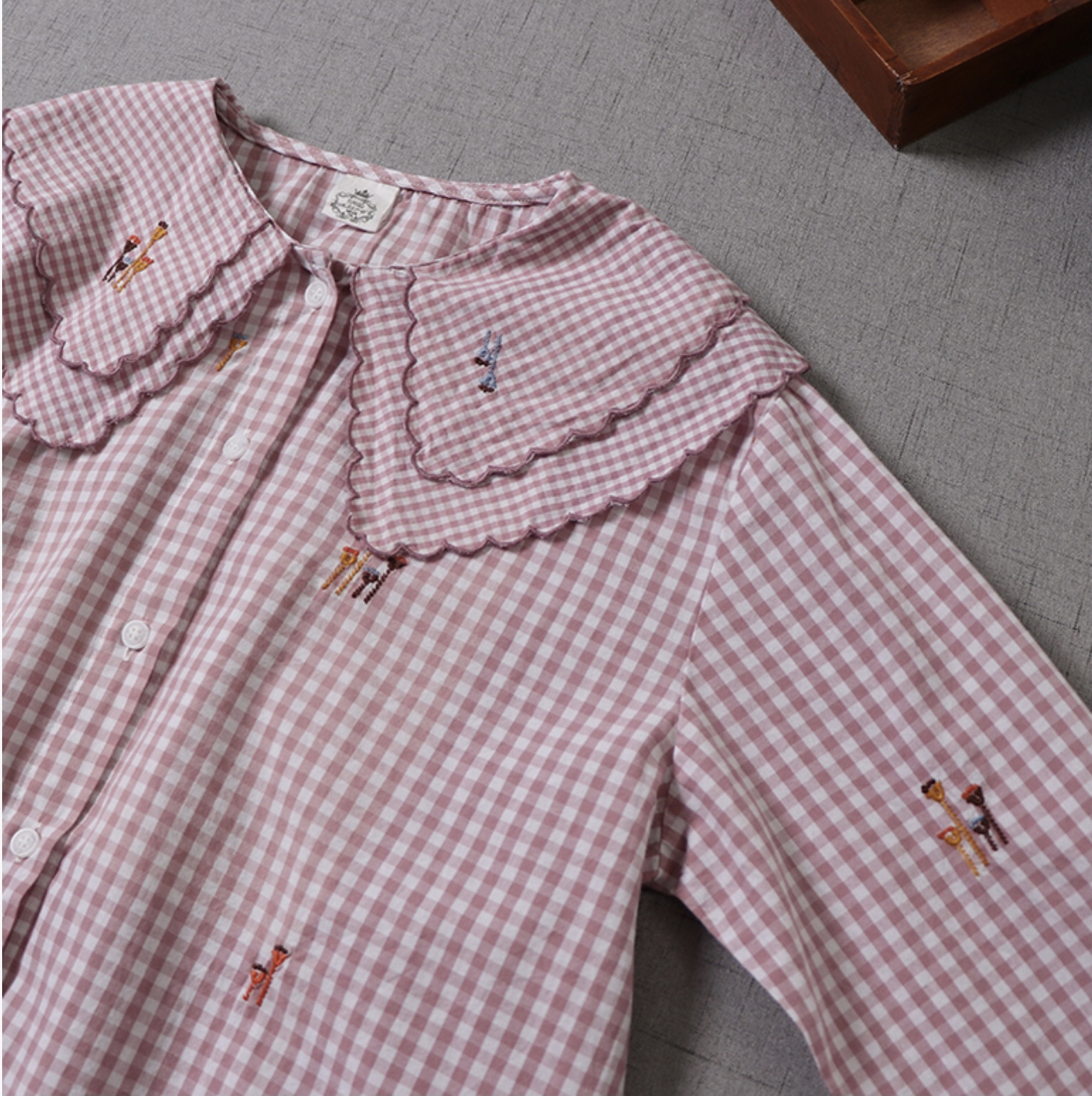 เสื้อผ้าฝ้ายคอบัวแต่งปก 2 ชั้น