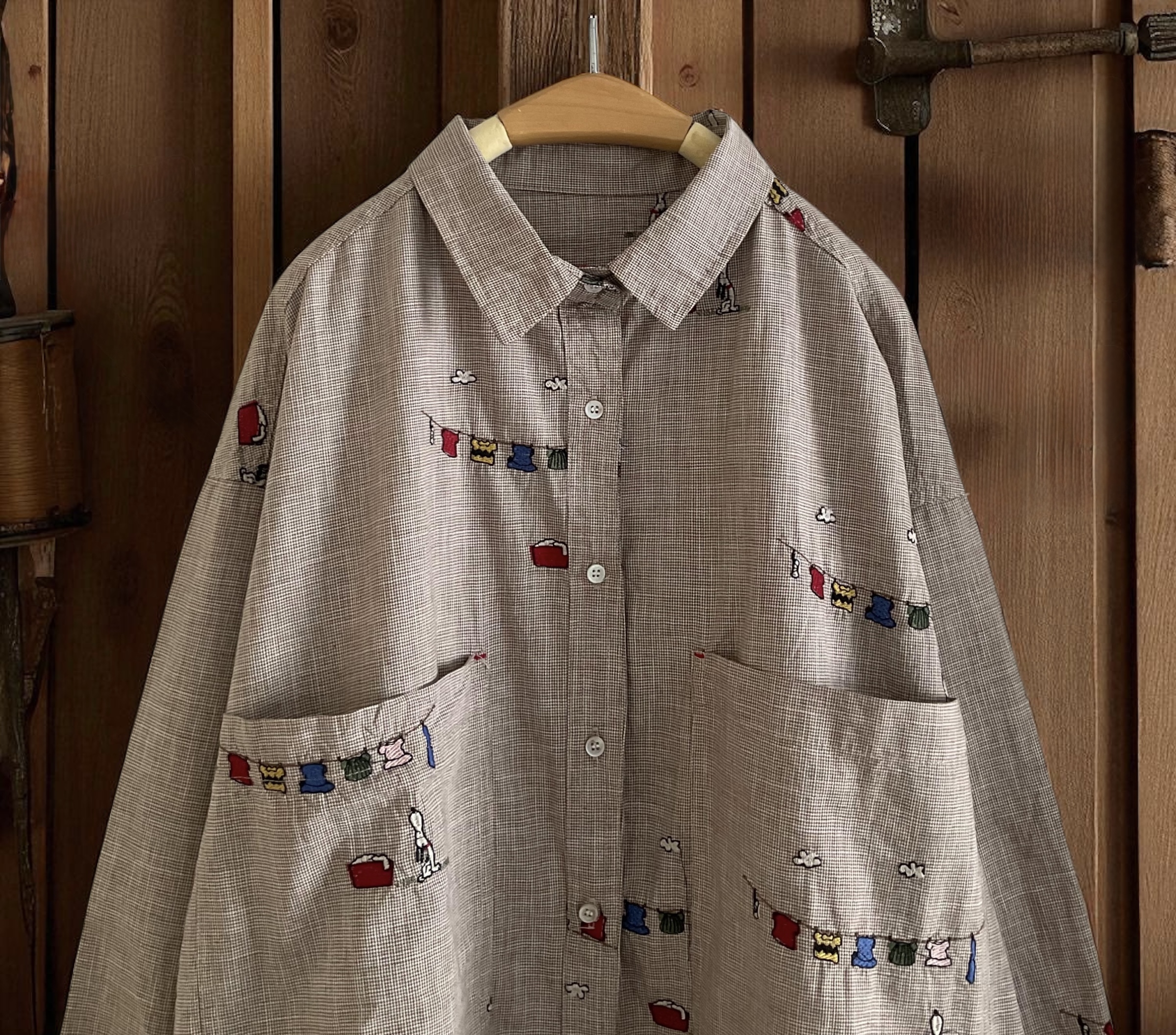 เสื้อผ้าฝ้ายลายปักแต่งกระเป๋า