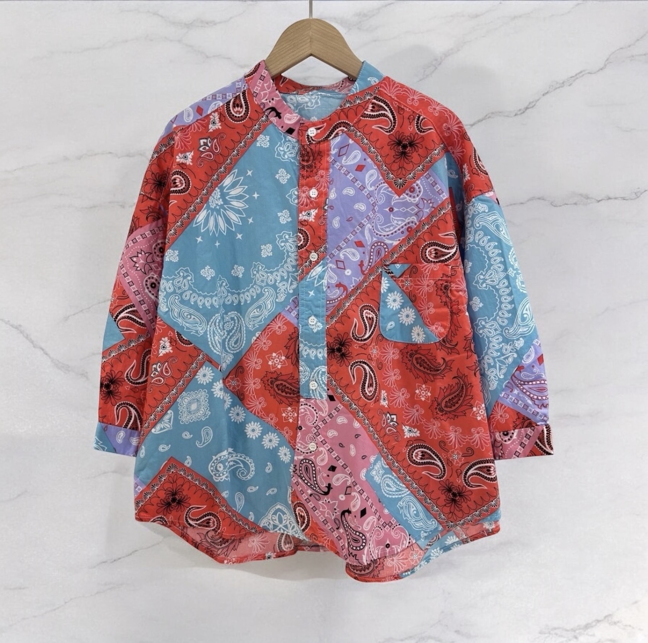 เสื้อผ้าฝ้ายแขนสามส่วนแต่งกระเป๋า