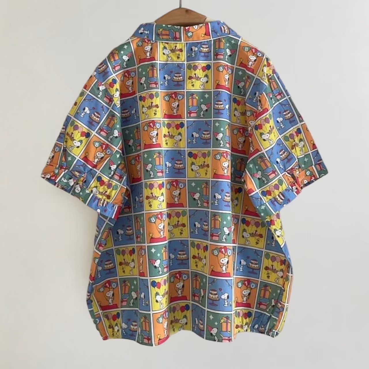 เสื้อผ้าฝ้ายลายพิมพ์แต่งกระเป๋า