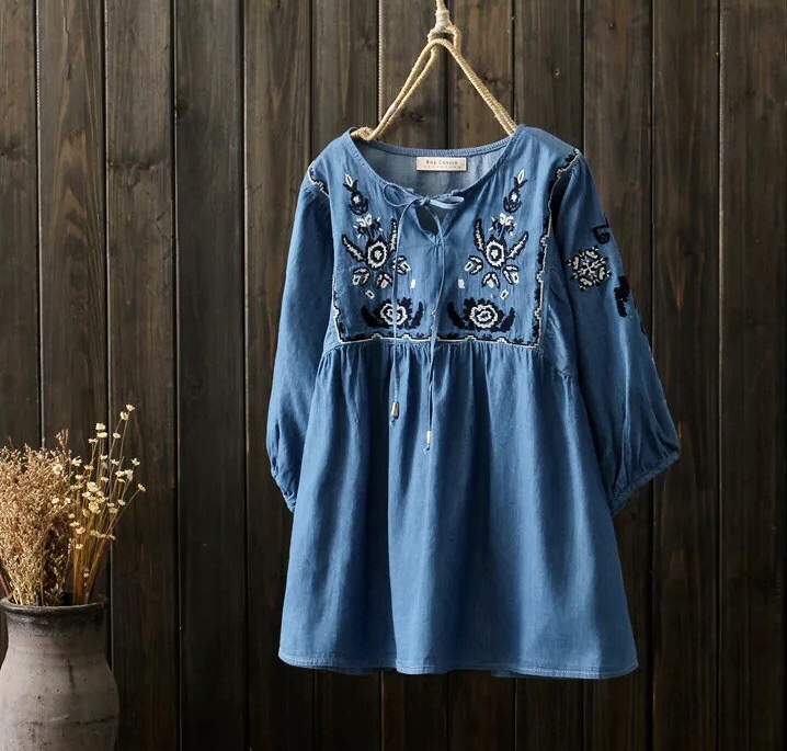เสื้อยีนส์ปักลาย
