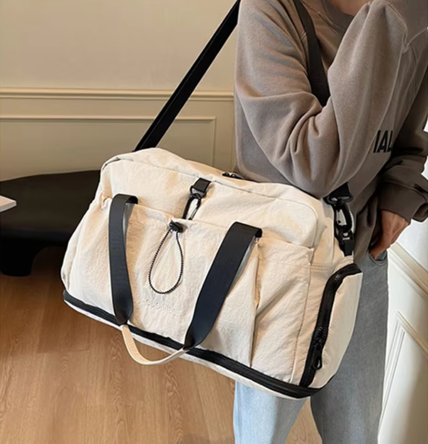 กระเป๋าเดินทางแบบหิ้วพร้อมสายสะพายข้าง ขยายฐาน ขนาด ก.48*ส.28*ก้น 21 ซม.