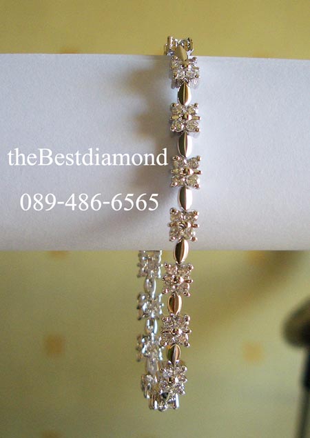 BC007RD==สร้อยข้อมือเพชรรูปดอกพิกุลรอบวง== ดีไซน์น่ารักๆ เป็นรูปดอกไม้ คั่นด้วยทองที่ออกแบบเป็นปล้องๆ ดูลงตัว งานเหมือนจริงสุดๆ หรูหราพอสมควร
