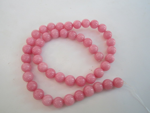 ลูกปัดสีชมพูจำนวน.47.เม็ด.เส้นที่.1.