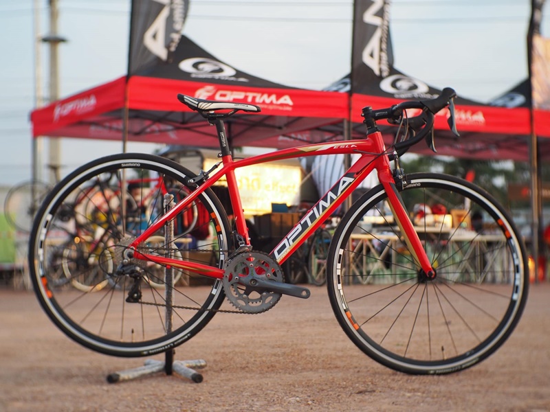 OPTIMA TESLA R3000 เสือหมอบ ออลอะราวด์ เฟรมอลู ตะเกียบคาร์บอน 18สปีด Sora เต็ม 2023