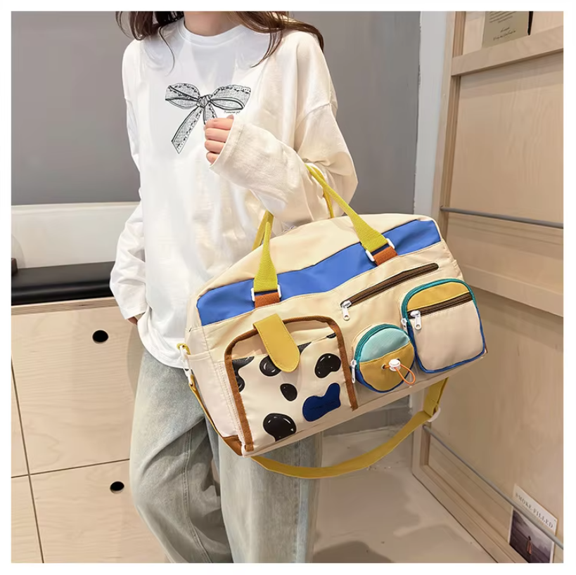 กระเป๋าเดินทางแบบหิ้วพร้อมสายสะพายข้าง รุ่น A-9919 ขนาด ก.47*ส.27*ก้น 22 ซม.