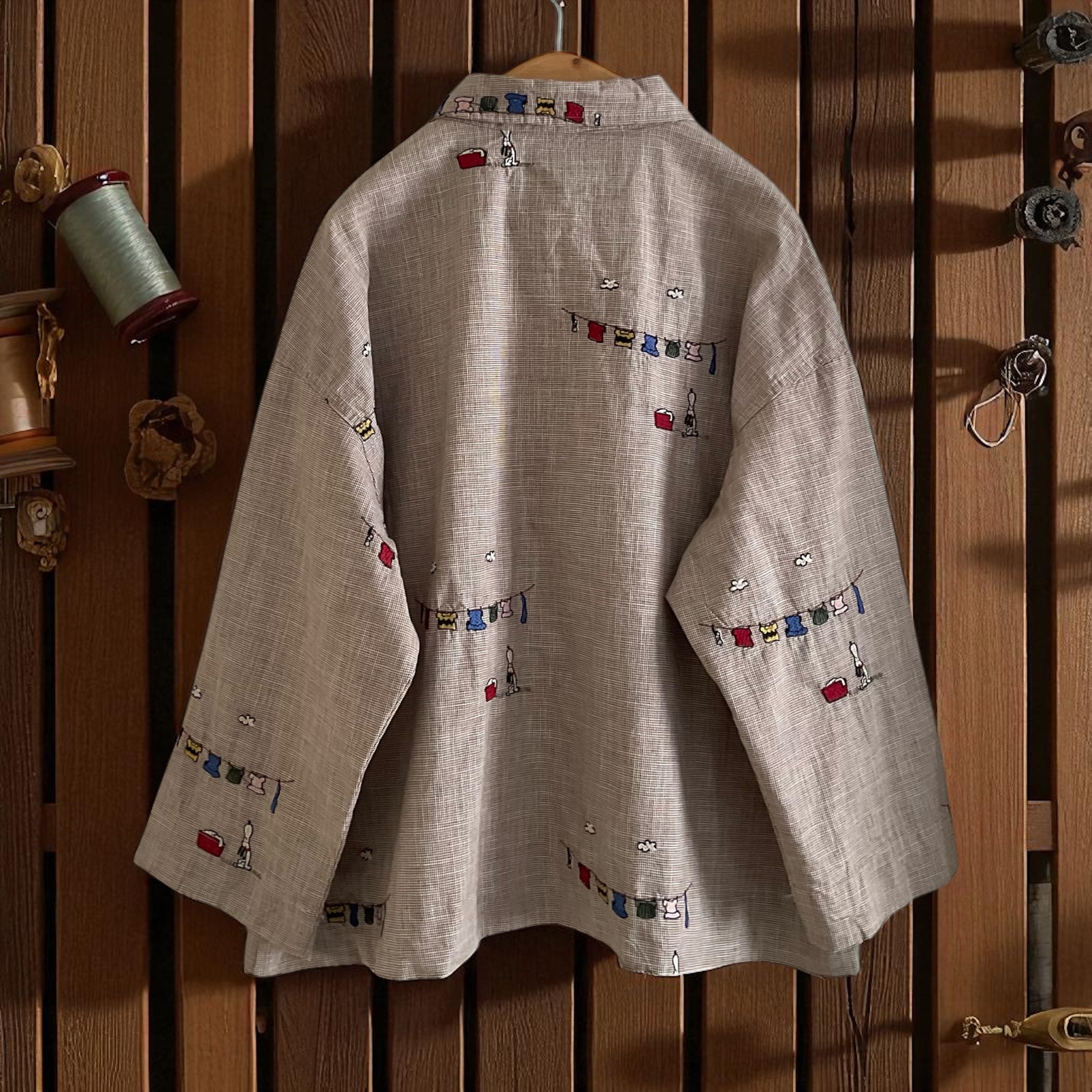 เสื้อผ้าฝ้ายลายปักแต่งกระเป๋า