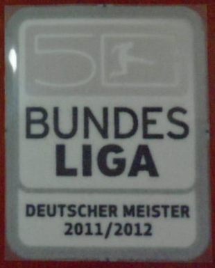 อาร์มสัญลักษณ์ฟุตบอล การแข่งขันฟุตบอลบุนเดสลีกา - BUNDESLIGA CHAMPIONS 'DEUTSCHER MEISTER' 2011/12 PLAYER SIZE ใหม่ / BUNDESLIGA National Football League PLAYER SIZE Football Patch/Badge - BUNDESLIGA CHAMPIONS 'DEUTSCHER MEISTER' 2011/