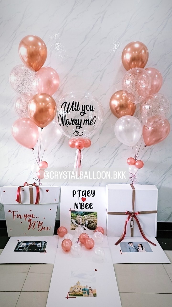 Surprise Box Will You Marry Me? กล่องเซอร์ไพรส์ขอแต่งงาน Theme Rose Gold พร้อมตกแต่ง ช่อลูกโป่ง 7 ลูก 2 ช่อ สามารถติดรูปได้ 4 รูป สามารถเปลี่ยนสีลูกโป่ง/เปลี่ยนข้อความได้