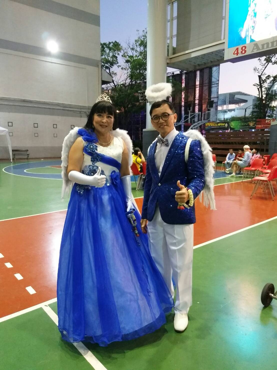 พร้อมเช่า ชุดแฟนซี ชุดราตรียาว สีน้ำเงิน เกาะอกไหล่เดียว แต่งดอกไม้ช่วงบน กระโปรงพองสวย