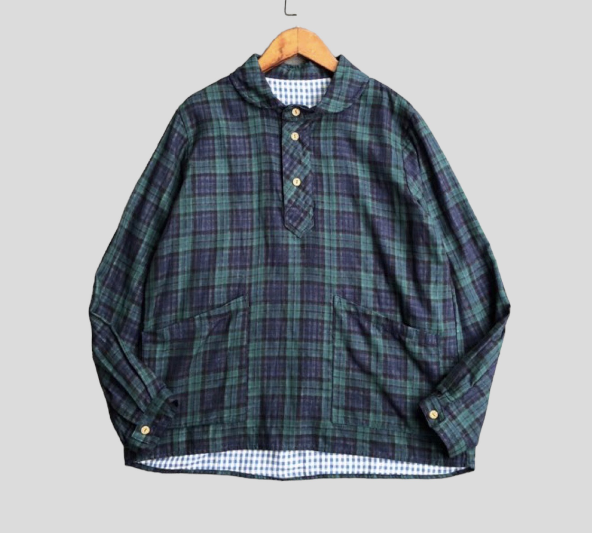 เสื้อผ้าฝ้ายลายสก็อตแต่งกระเป๋า