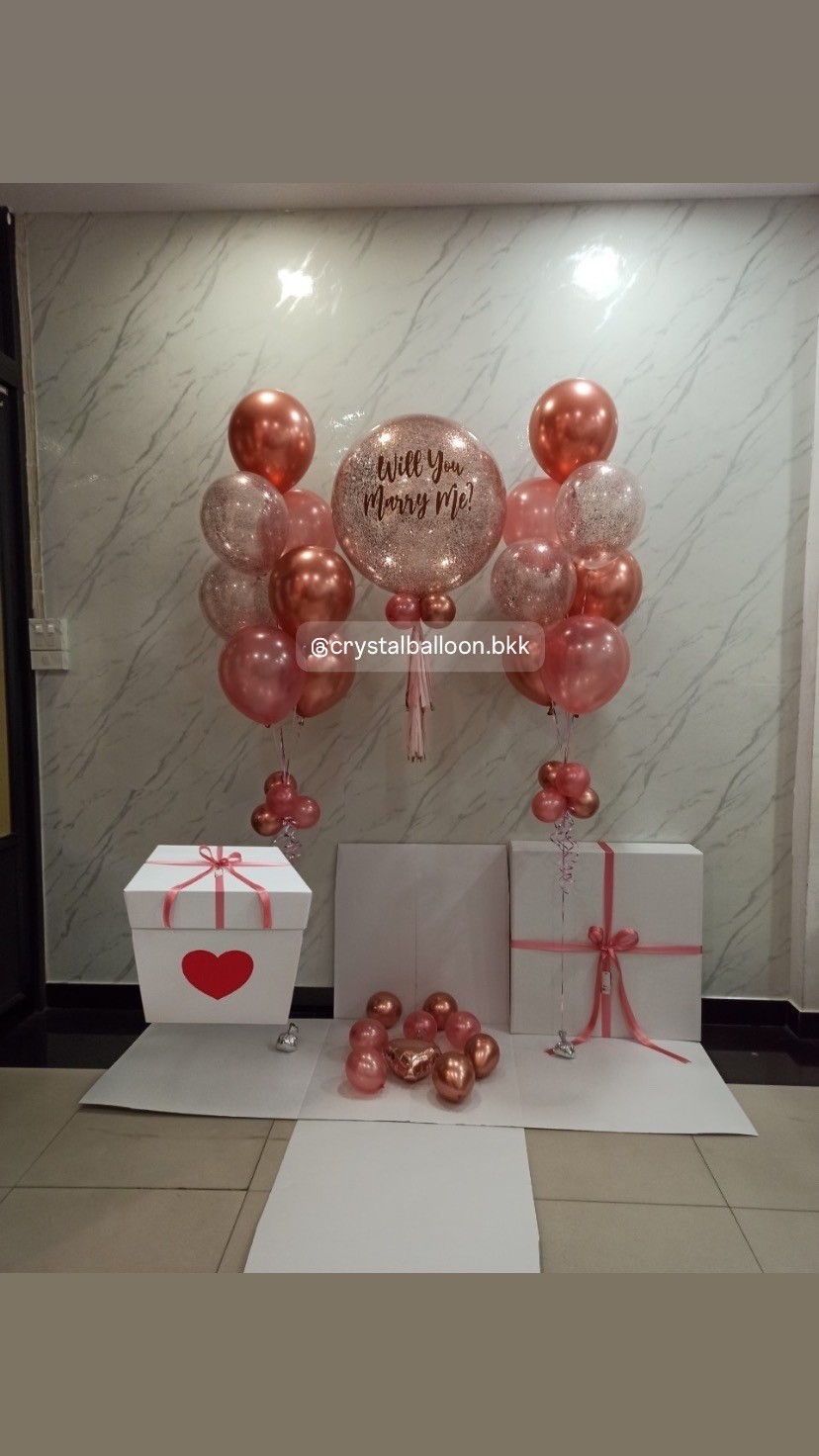 Will You Marry Me Surprise Box กล่องเซอร์ไพรส์ Bubble ขนาด 24"กลิตเตอร์สีโรสโกลด์ ,ลูกโป่งช่อ 7 ลูก 2 ช่อ, พร้อมตกแต่ง สามารถใส่รูปได้ 4 ใบ สามารถเปลี่ยนสีลูกโป่ง/เปลี่ยนข้อความได้