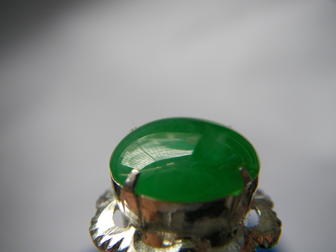 หยกพม่า jadeite หรือ jade เนื้อแก้วน้ำผึ้ง ออกเขียวกลาง ขนาด 9.07x9.81x3.08 mm. นน. 2.44 ct. ราคาโทรถาม