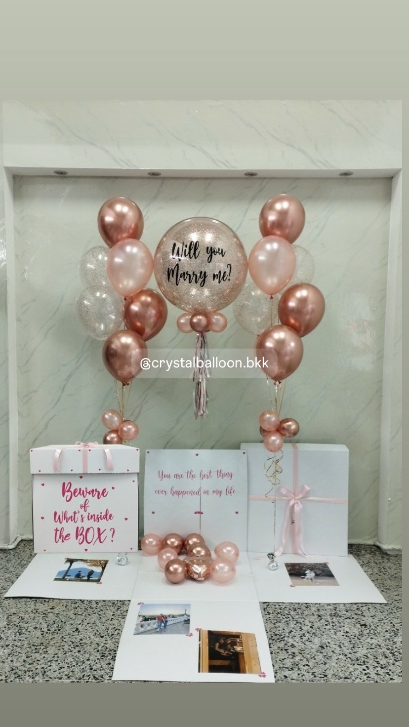 Will You Marry Me Surprise Box กล่องเซอร์ไพรส์ขอแต่งงาน Bubble ขนาด 24" กลิตเตอร์โรสโกลด์ ,ลูกโป่งช่อ 7 ลูก 2 ช่อ , พร้อมตกแต่ง สามารถใส่รูปได้ 4 ใบ สามารถเปลี่ยนสีลูกโป่ง/เปลี่ยนข้อความได้