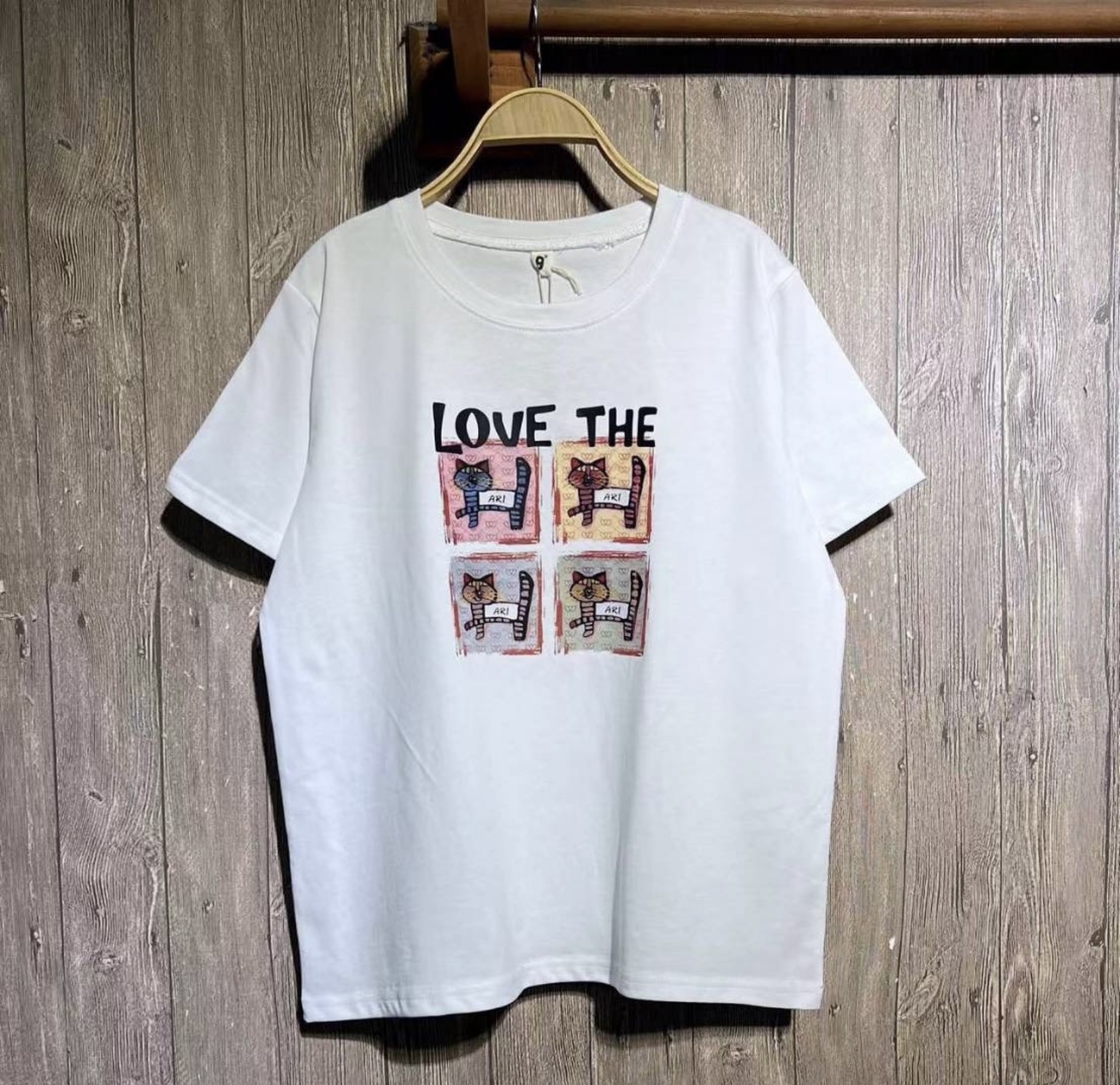 เสื้อยืดสกรีนลายแมว 9am